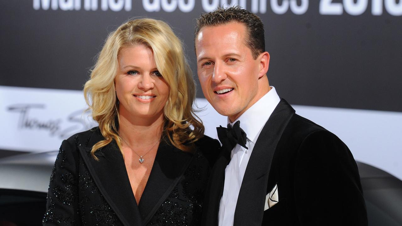 Formula 1 driver Michael Schumacher and his wife Corinna. AFP PHOTO / JENS KALAENE GERMANY OUT