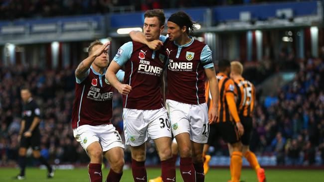 Ashley Barnes of Burnley (C) celebrates scoring the opening goal.