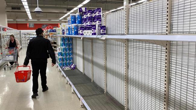 Toiler paper shelves in this Melbourne supermarket were stripped nearly bare again last week. Picture: AFP