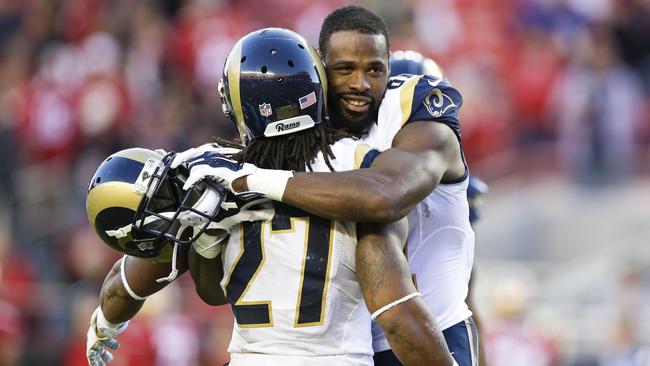 Kenny Britt celebrates with Tre Mason after beating the San Francisco 49ers.