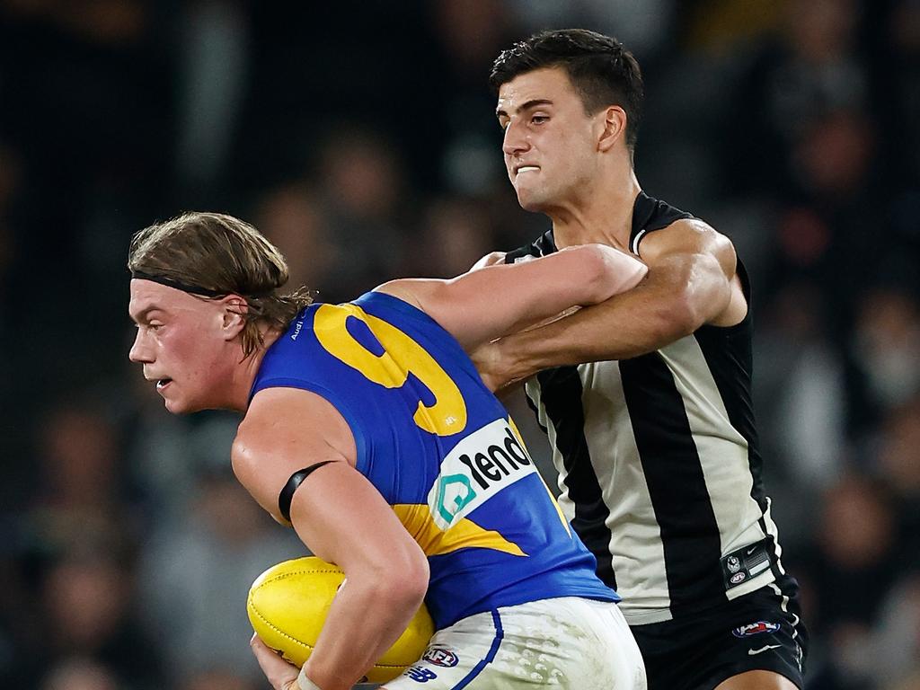 MELBOURNE, AUSTRALIA - MAY 12: Harley Reid of the Eagles is tackled by Nick Daicos of the Magpies during the 2024 AFL Round 09 match between the Collingwood Magpies and the West Coast Eagles at Marvel Stadium on May 12, 2024 in Melbourne, Australia. (Photo by Michael Willson/AFL Photos via Getty Images)