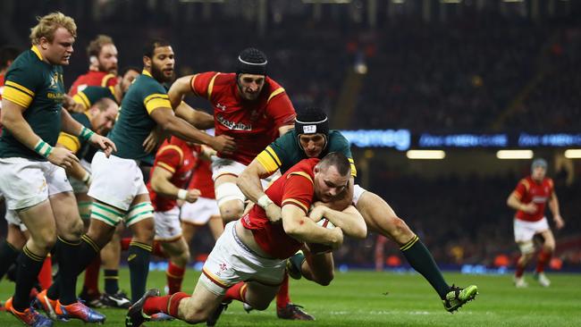 Ken Owens dives over to score for Wales against the Springboks in Cardiff, Wales.
