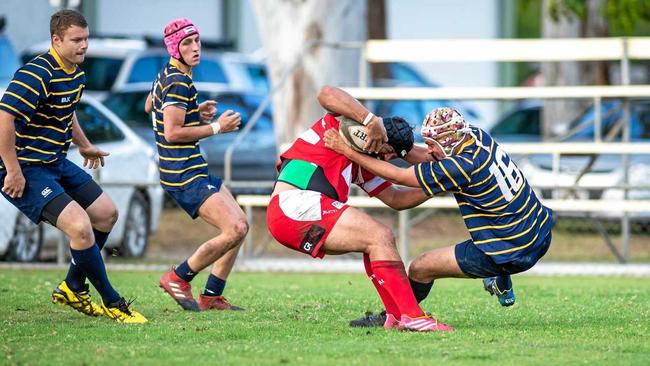 STRONG DEFENCE: Gympie Hammers Grant I'Anson muscles up in defence to stop the Nambour Toads forwards. Picture: Leeroy Todd