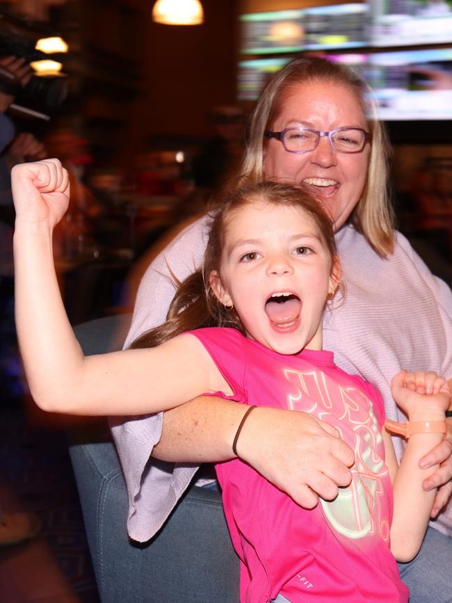 Fans react to their team’s last minute victory.