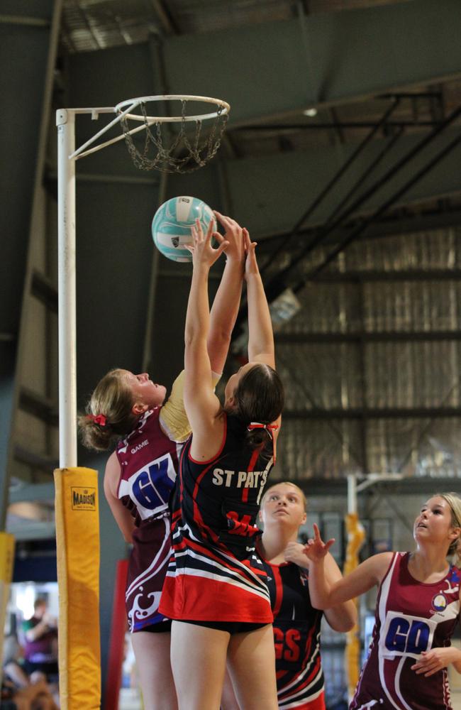 Netball action from QISSN 2024 in Townsville. Carmel College v Shalom College