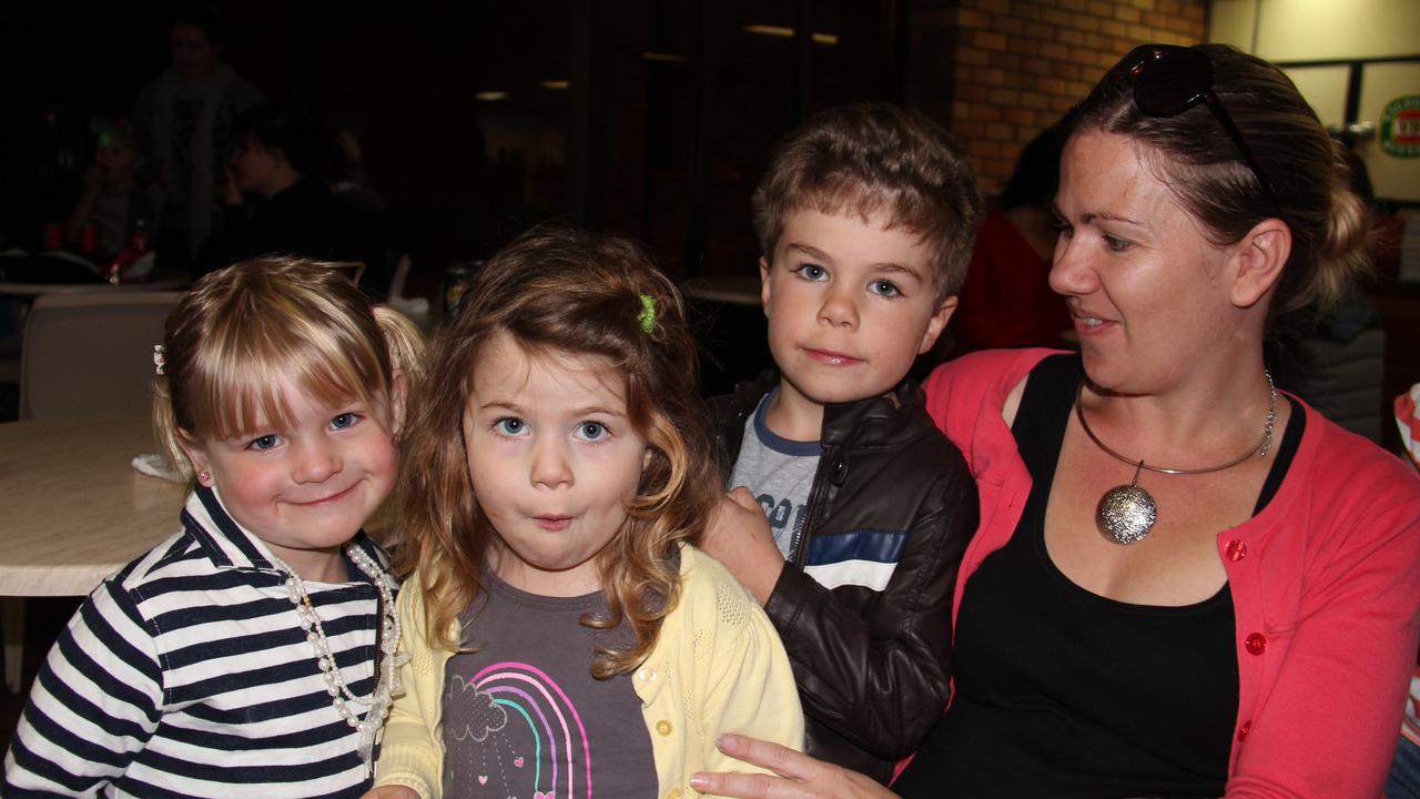 Claire Dunbar, Georgie Cox, Aiden Cox and Shannon Cox take a break from the dance floor at the Blue Light Disco on Friday night. Photo Erin Smith / Stanthorpe Border Post