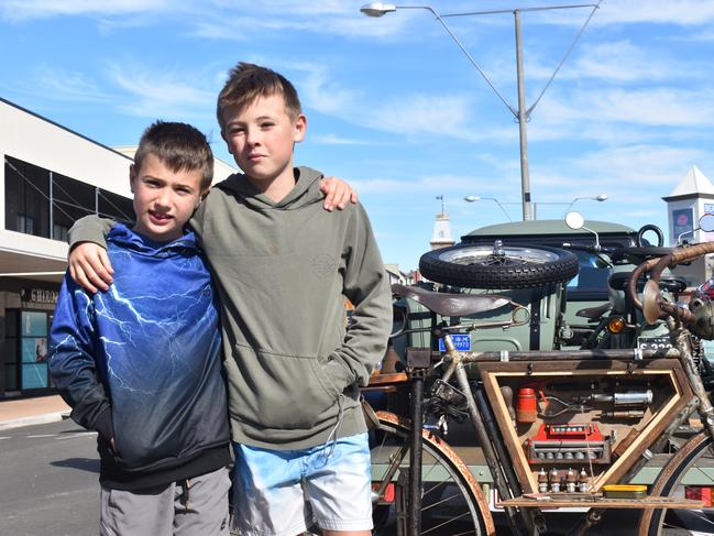 Maddox and Brooklyn King next to one of their favourite finds at the Jumpers and Jazz Grand Automobile Show on July 18, 2021.