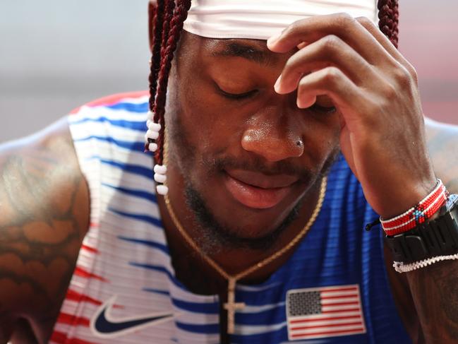 TOKYO, JAPAN - AUGUST 05: Cravon Gillespie of Team United States reacts after coming in sixth in round one of the Men's 4 x 100m Relay Heat 2 on day thirteen of the Tokyo 2020 Olympic Games at Olympic Stadium on August 05, 2021 in Tokyo, Japan. (Photo by Patrick Smith/Getty Images)