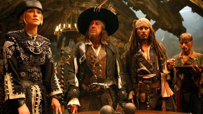 Actor (l-r) Keira Knightley with Geoffrey Rush and Johnny Depp in scene from film ''Pirates of The Caribbean: At Worlds End''. /Films/Titles/Pirates/of/The/Caribbean/At/Worlds/End