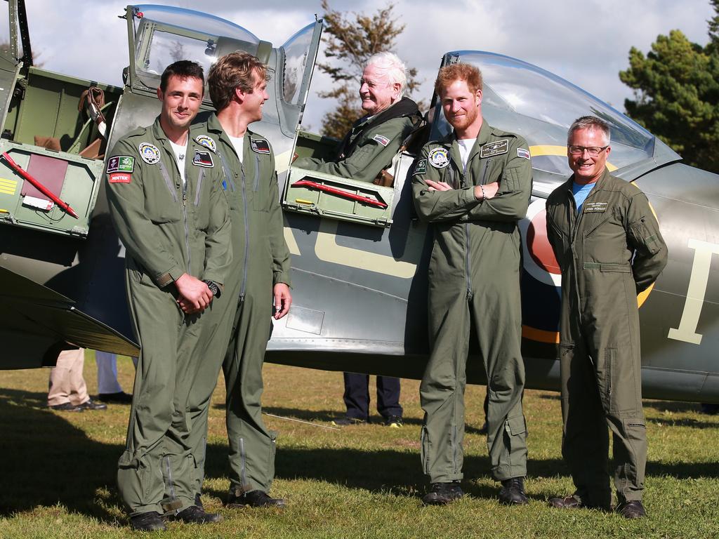 Prince Harry poses next to 95 year old Battle of Britain Veteran Tom Neil after he landed back at Goodwood Aerodrome in his Spitfire after a Battle of Britain Flypast in Chichester, England. Picture: Getty