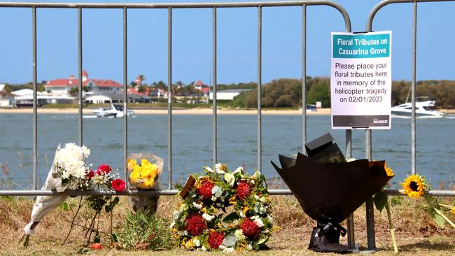 People who wanted to pay tribute to the victims were directed to do so in a park across the Broadwater from Sea World. Picture: David Clark