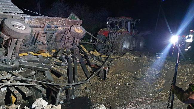 The carter and damaged equipment left by a missile strike on a Polish grain farm. Picture: Facebook