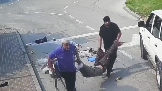 A screengrab from a video showing an UNRWA worker, driving a white UN jeep, abducting the body of Israeli Jonathan Samerano, who was killed by Hamas terrorists on October 7.