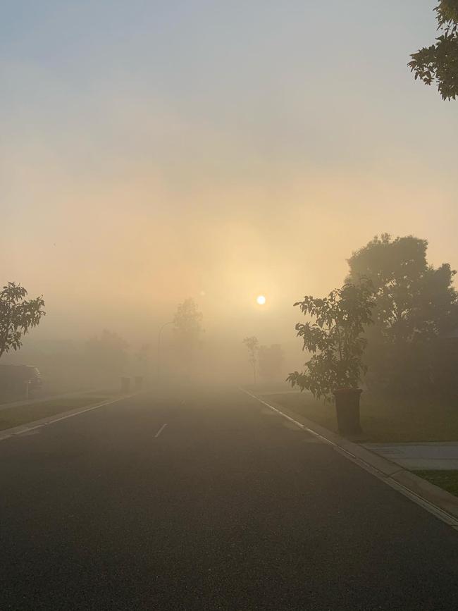 A combination of fog and smoke made Lyons look like this today. Picture: Rayven Nguyen