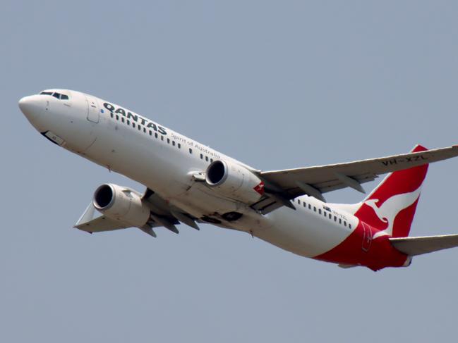 QANTAS plane departing from Brisbane Airport Pictures David Clark Photography