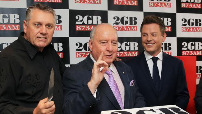 Ray Hadley and Alan Jones, with Ben Fordham during a celebration of their 10 years as the number one radio station in Sydney. Picture: Mark Evans