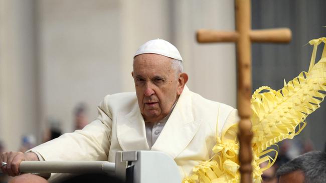 Pope Francis in the Popemobile during the celebration of the Palm Sunday mass at St Peter's Square in The Vatican. Picture: AFP