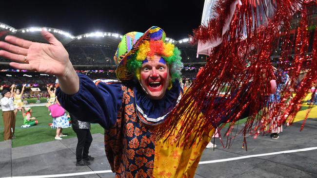 A clown waves hello from the Christmas Pageant at Adelaide Oval. Picture: Keryn Stevens