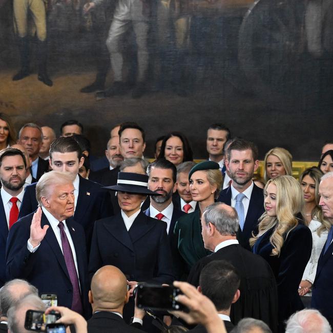 Donald Trump with family and friends as he is sworn in. Picture: Saul Loeb / POOL / AFP