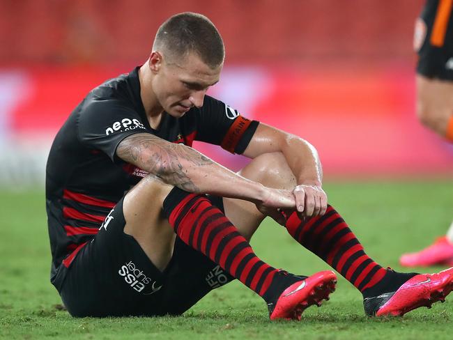 BRISBANE, AUSTRALIA - MARCH 06: Mitchell Duke of the Wanderers reacts after the loss during the round 22 A-League match between the Brisbane Roar and the Western Sydney Wanderers at Suncorp Stadium on March 06, 2020 in Brisbane, Australia. (Photo by Jono Searle/Getty Images)