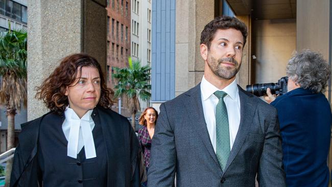 Former commando Heston Russell, right, arrives at the Federal Court in Sydney. Picture: NCA NewsWire / Christian Gilles