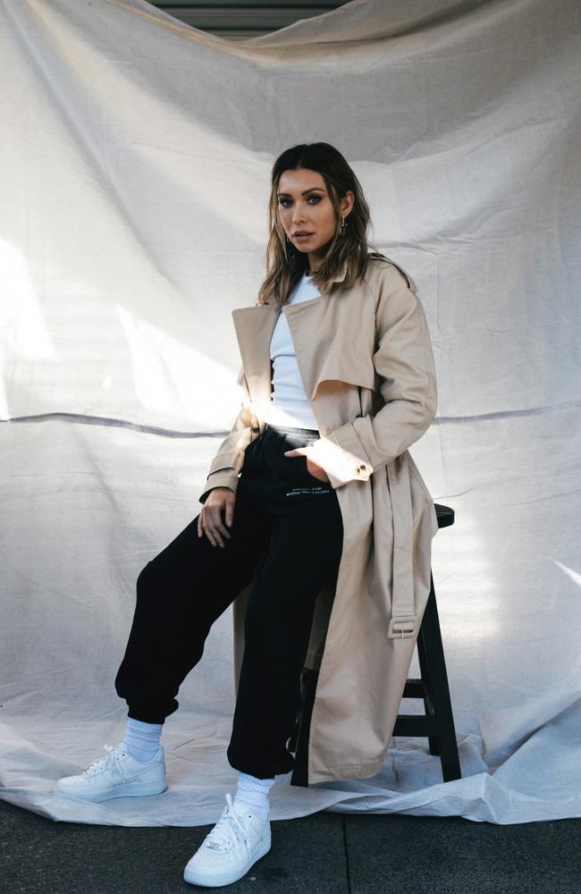 Rozalia Russian models her sold-out new capsule collection – featuring a tank, trench and trackies – for Atoir. Picture: Atoir