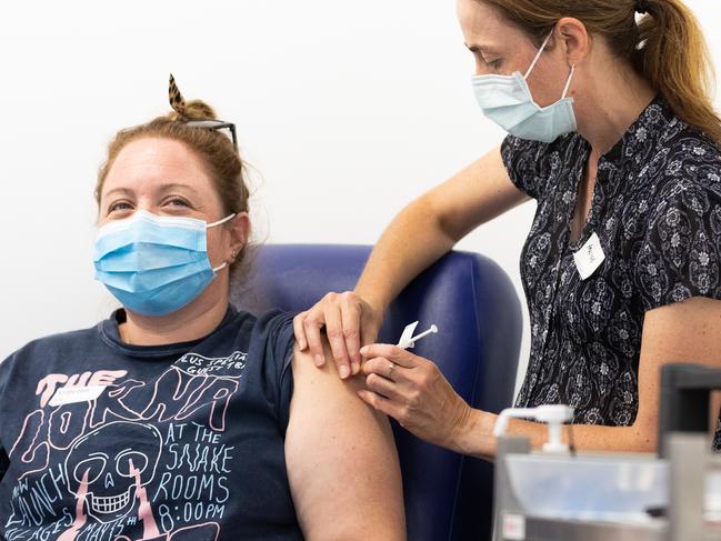 MELBOURNE, AUSTRALIA - MARCH 17: A nurse administers the AstraZeneca COVID-19 vaccine to a patient at the Austin Hospital on March 17, 2021 in Melbourne, Australia.  An online system has opened for phase 1B of the Australian COVID-19 vaccination program which includes people over aged 70, frontline workers, and individuals with certain medical conditions. Over 1000 general practitioners are participating in the vaccination program. (Photo by Asanka Ratnayake/Getty Images)