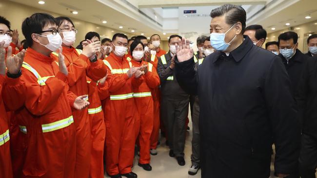 Xi Jinping meets the workers in Zhejiang on Sunday. Picture: AP