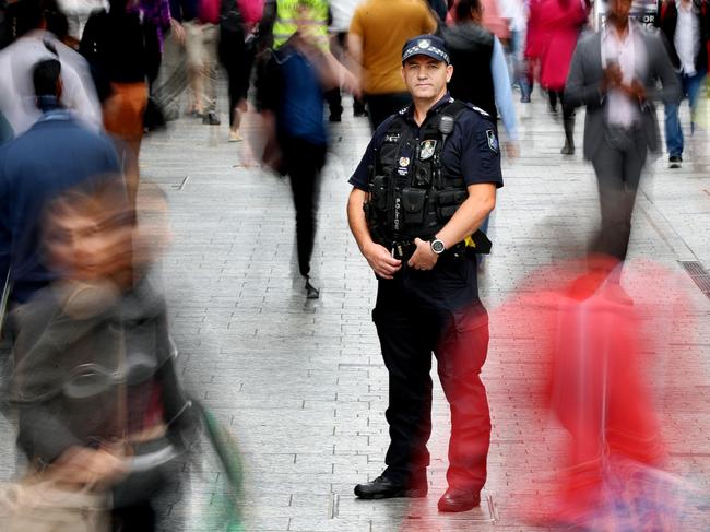 Snr Sgt Chris Tritton in Brisbane CBD. Pics Tara Croser.