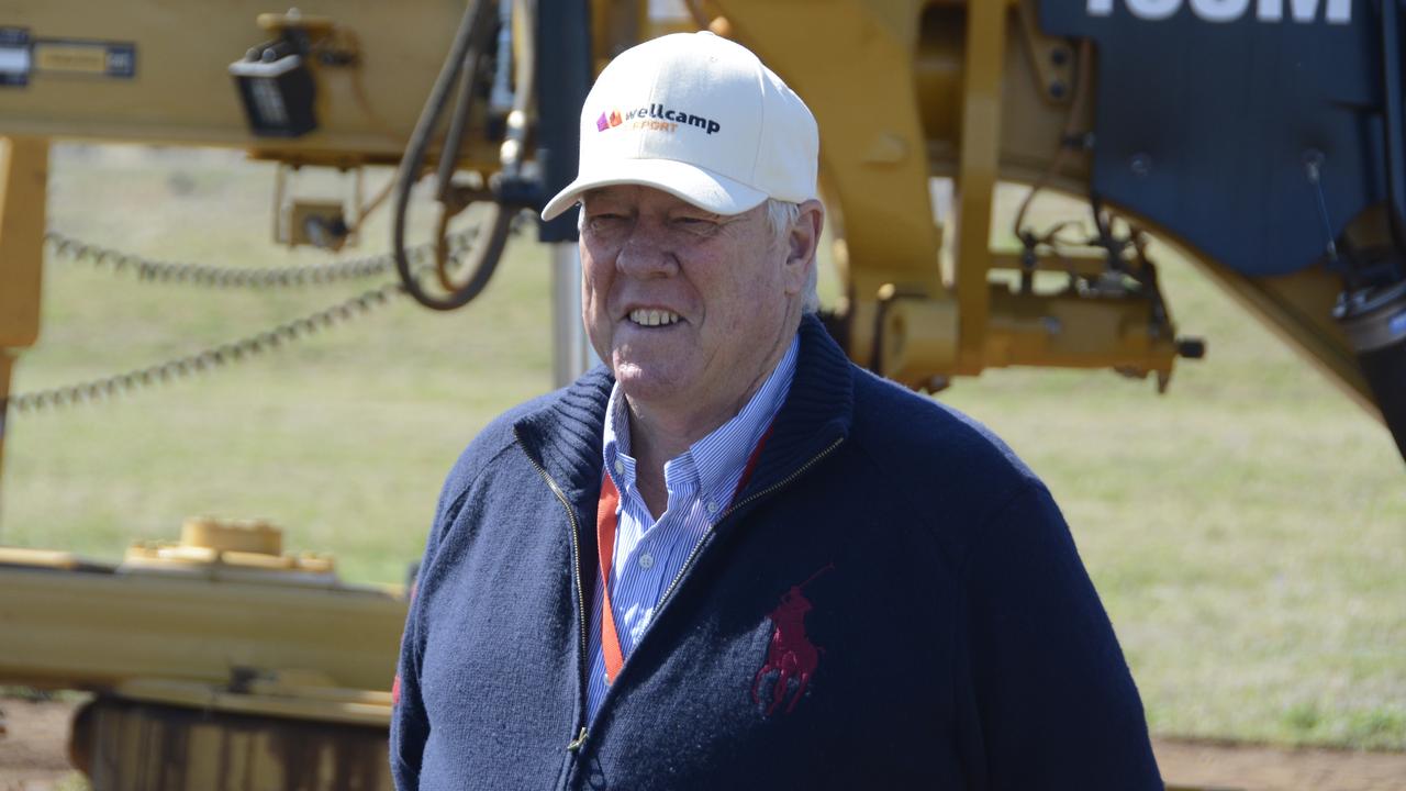 ALL SMILES: Wagner Corporation chairman John Wagner at the announcement a quarantine hub would be built at Wellcamp Airport, owned by the Wagners.