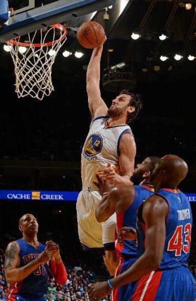 Bogut goes up for a dunk against Detroit.