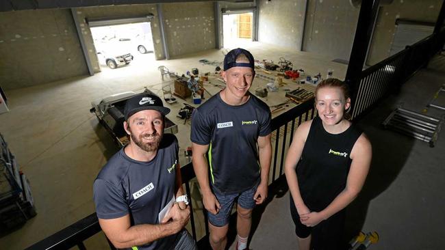 L-R Sean O'Neill, Jake Standen and Bridget Dunning from CQ Crossfit at the space they will be moving into in the new year. Picture: Chris Ison ROK281117cbuilding3