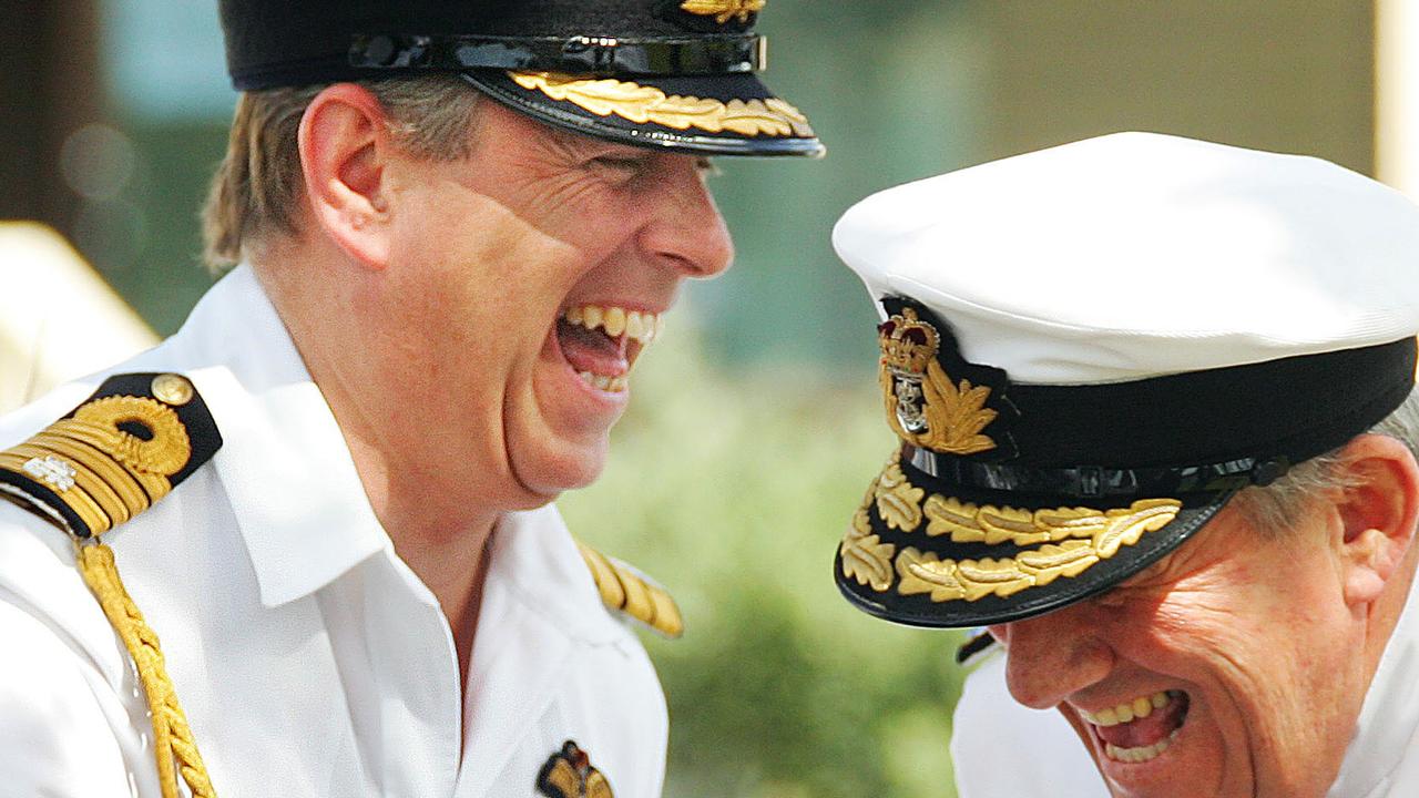 Prince Andrew shares a laugh with Rear Admiral David Ledson in 2007. Picture: AFP