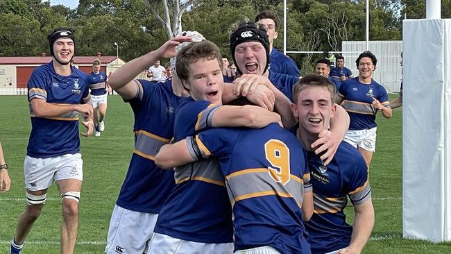 Churchie celebrate Archie Wilson's second try.