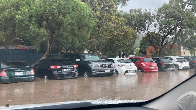 Cars flooded at Ferntree Gully station. Picture: Kevin Pratt