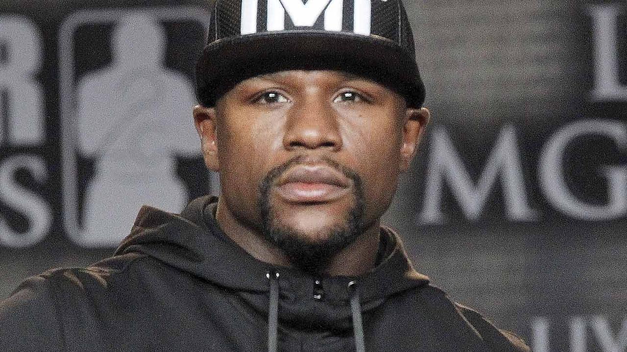 Floyd Mayweather Jr., left, and Andre Berto pose at a news conference in Los Angeles on Thursday, Aug. 6, 2015. Mayweather says Berto is a worthy opponent for the final fight of his perfect career. (AP Photo/Nick Ut)