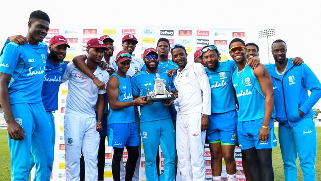 West Indies players pose with the Wisden trophy after beating England 2-1. Picture: AFP