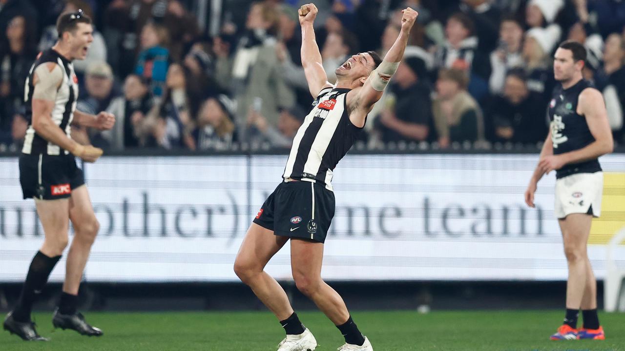 MELBOURNE, AUSTRALIA - AUG 03: Scott Pendlebury of the Magpies celebrates as the final siren sounds during the 2024 AFL Round 21 match between the Collingwood Magpies and the Carlton Blues at The Melbourne Cricket Ground on August 03, 2024 in Melbourne, Australia. (Photo by Michael Willson/AFL Photos via Getty Images)