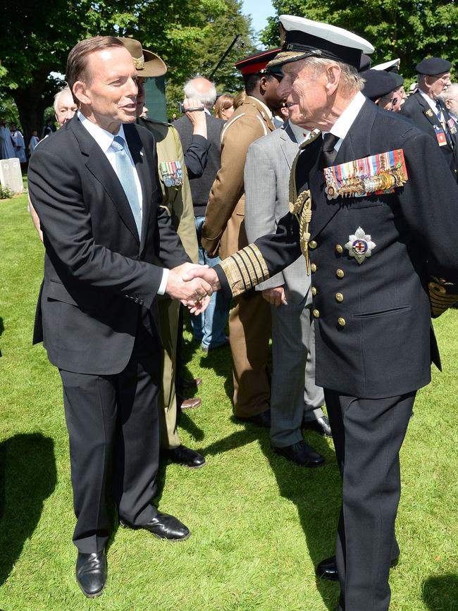 Tony Abbott meets Prince Philip, Duke of Edinburgh as they attend a Service of Remembrance at Bayeux cathedral during D-Day 70 in 2014.