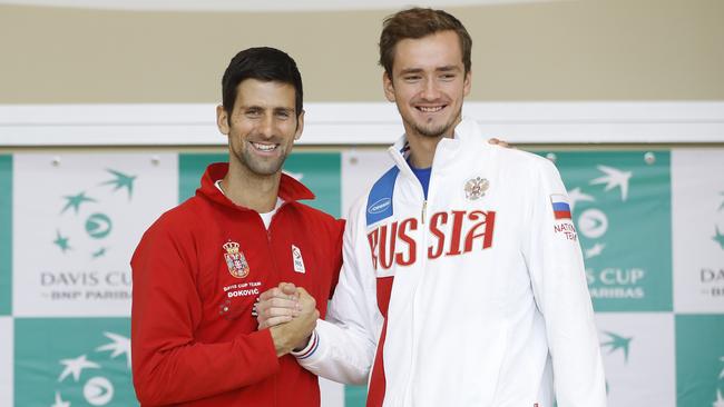 Novak Djokovic (L) with Daniil Medvedev (R) ahead of their Davis Cup match-up in 2017. Picture: Getty