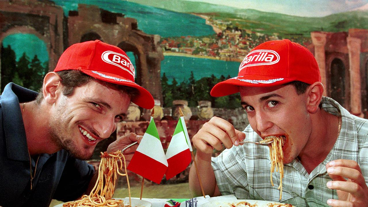 Donald Oswin, 21, and the previous year’s spaghetti eating champion David Crisafulli, 20, at the Australian Italian Festival in Ingham.