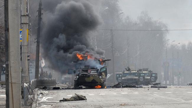 A Russian armoured personnel carrier ablaze in Kharkiv on Sunday. Picture: AFP