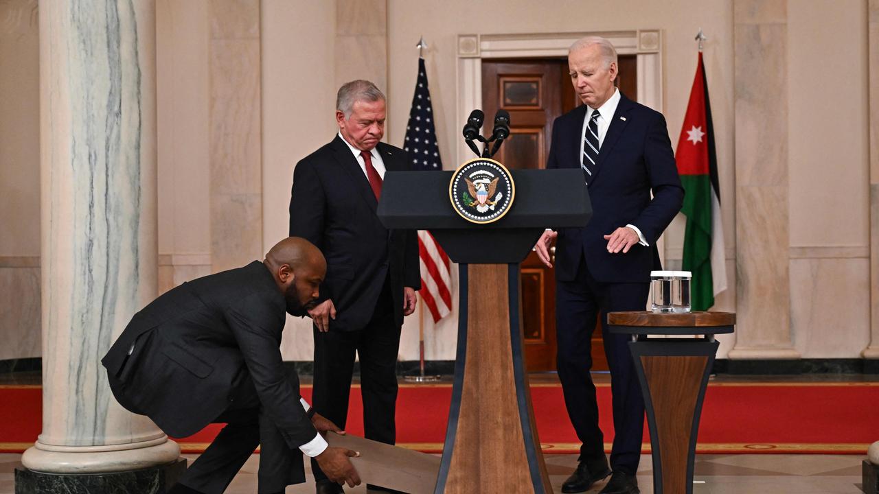 A confused-looking Biden paced back and forth behind King Abdullah II of Jordan. Picture: AFP