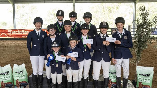 Victory College Interschool Show Jumping Competition's victorious primary and secondary teams (back, from left) Charlie Neil, Emily Davis, Olivia Hewitt-Toms, (middle row) Alyx Peters, Marnie Turner, Makayla Godwin, Saachi Stiefler, Madilyn Jessup-Little, Callum Lehman and (front row) Arianah Bazzan and Jameson Bazzan.