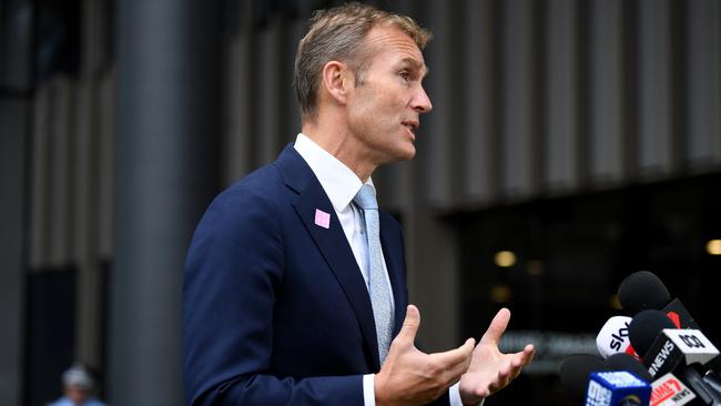 NSW Minister for Planning and Public Spaces Rob Stokes speaks to the media during a press conference outside the RFS Headquarters in Sydney Picture: Joel Carrett