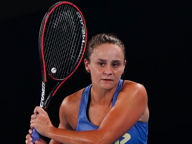 Ashleigh Barty of Australia plays a shot during an Australian Open practice session at Melbourne Park in Melbourne, Sunday, January 19, 2020. (AAP Image/Scott Barbour) NO ARCHIVING