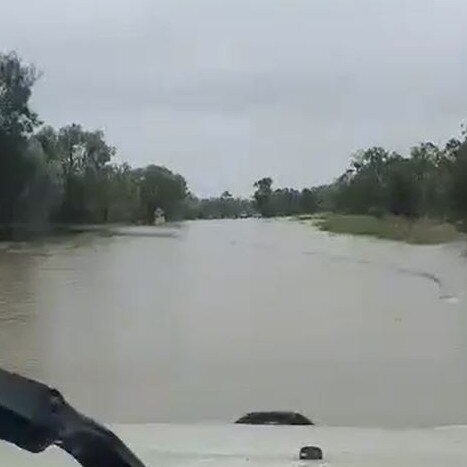 The Mitsubishi Triton attempts to cross floodwaters on the Leichhardt Hwy north of Goondiwindi. Picture: Supplied