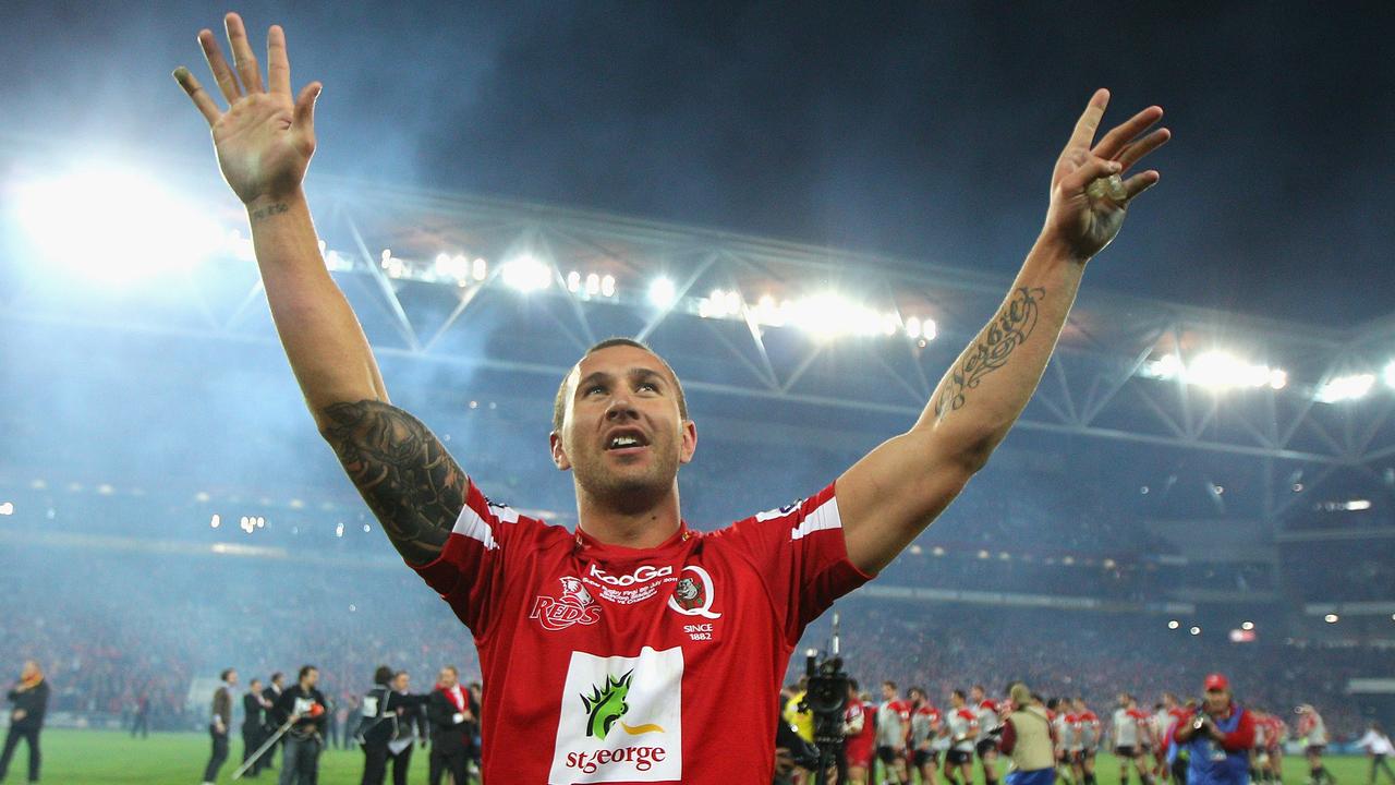 Quade Cooper of the Reds acknowledges the crowd after winning the 2011 final.