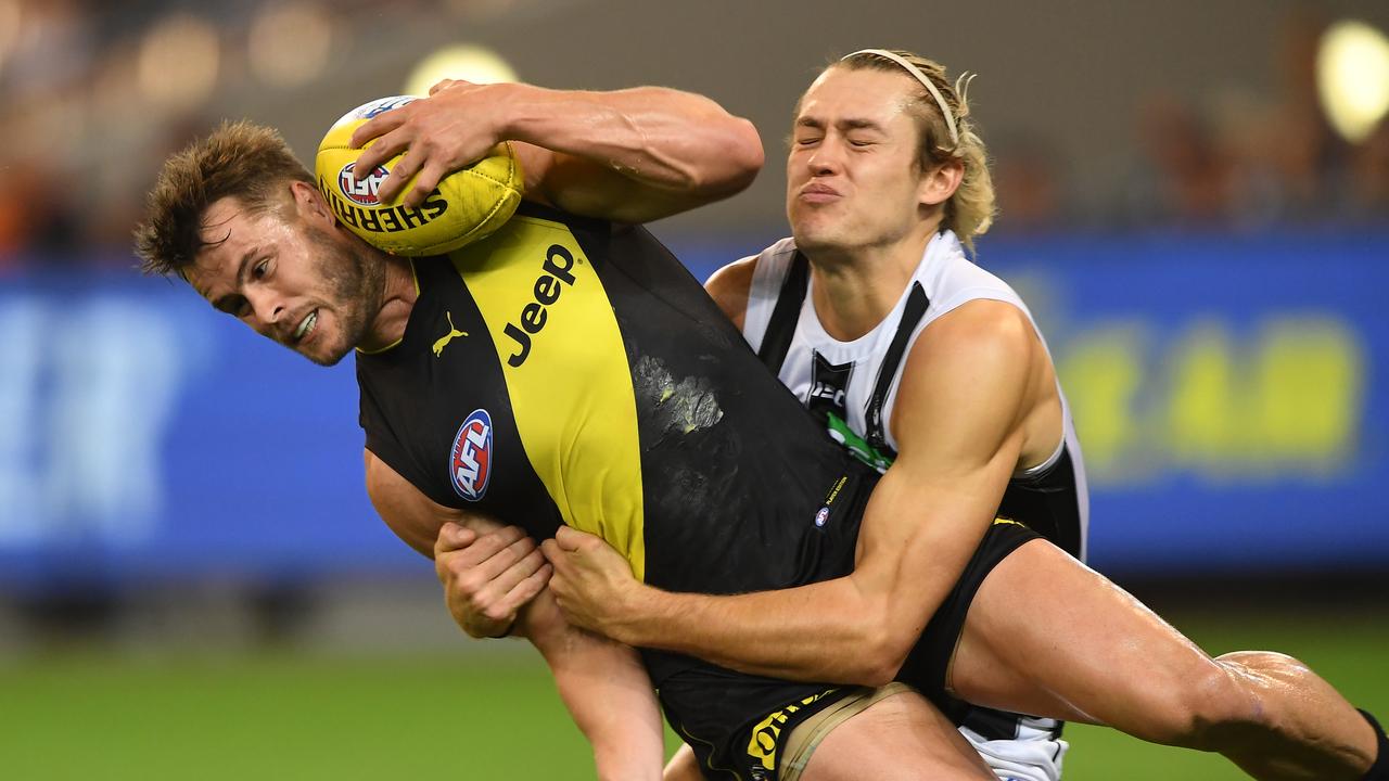 Darcy Moore (right) was linked with a move to Richmond. Photo: Julian Smith/AAP Image.