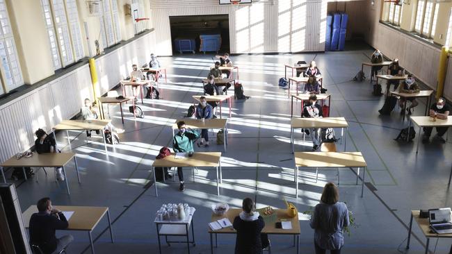 Students wearing face masks during exam preparation in Jena, Germany. Picture: AP